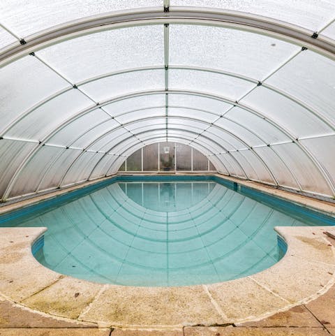 Swim laps in the estate's shared pool in summer