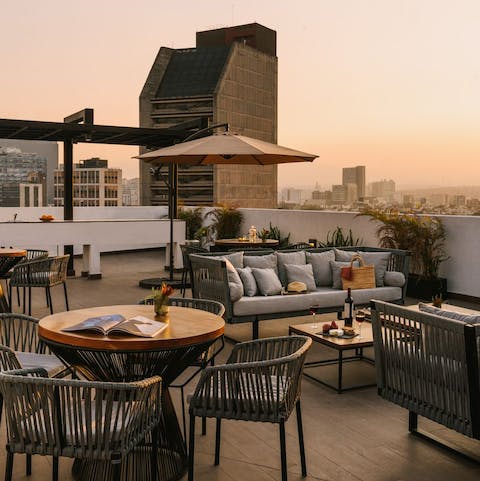 Relax on the communal roof terrace and take in the views over Mexico City