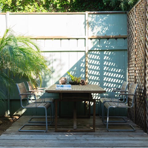 Sit down to a sumptuous outdoor meal in the inviting alfresco dining area