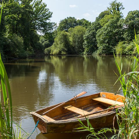 Go on a rowing adventure on the pond