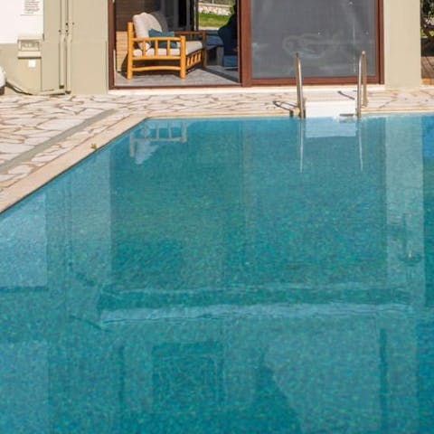Cool off from the Greek sunshine with a dip in the pool