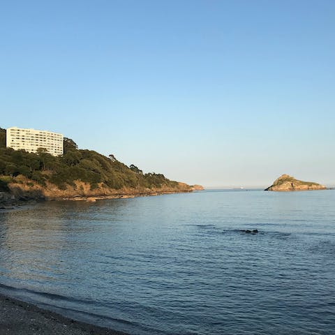 Grab your towel and enjoy a day on the sands of Torquay Beach, a short walk away