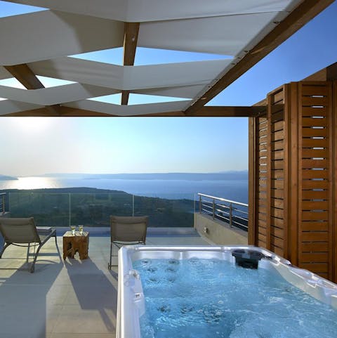 Take in the sparkling sea views from the warmth of the hot tub
