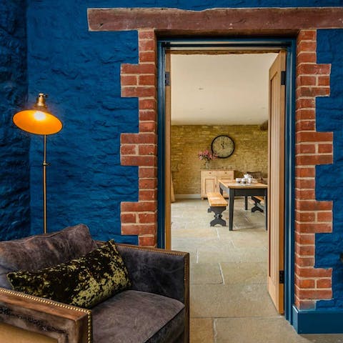 Fall in love with the characterful exposed brick, flagstone floors and blue-painted stone walls