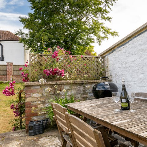 Rustle up the barbecue and enjoy an alfresco feast on the patio
