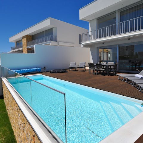 Luxuriate in your private, glass-fronted pool