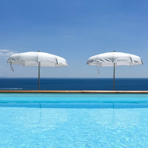 Hit the pool for a swim amongst the sea views