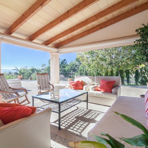 Enjoy some shots of Hierbas de Mallorca on your covered terrace