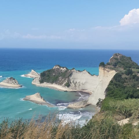 Stay on the Corfu coast and discover pristine beaches and epic scenery