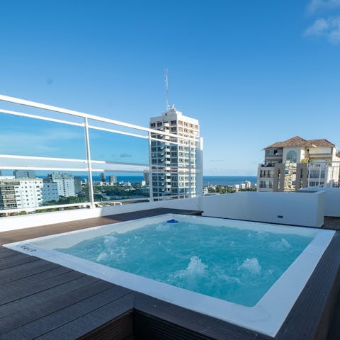 Enjoy a soak with a view in the communal rooftop Jacuzzi