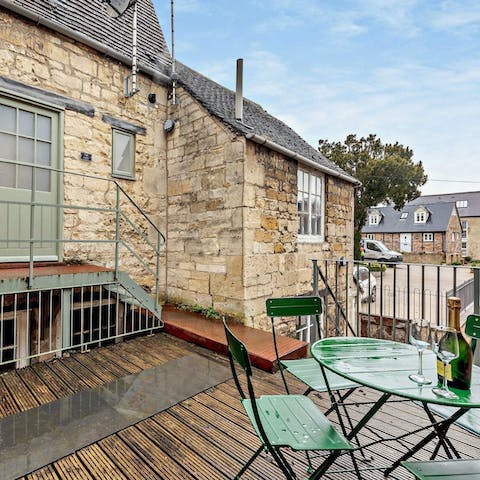 Sip sundowners on the roof terrace with your next-door neighbours