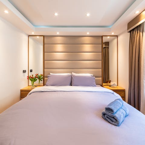Wake up in the sleek bedroom feeling rested and ready for another day of touring the city