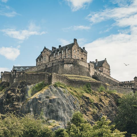 Explore historic Edinburgh Castle, a twelve-minute stroll from your home