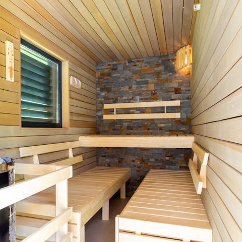 Soothe the mind and body in the deluxe sauna