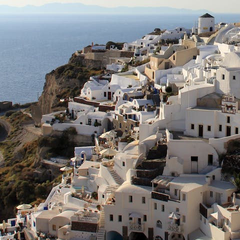 Explore beautiful Oia, including its castle 50 metres away