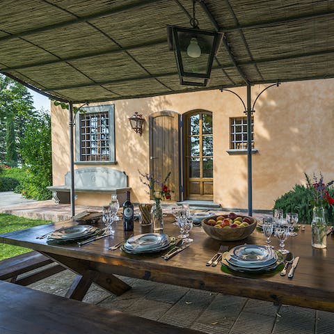 Spend alfresco evenings at the gorgeous, rustic dining table