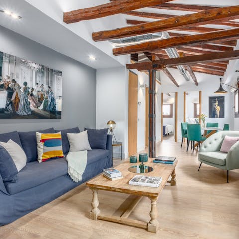 Relax in the bright living space after a busy afternoon exploring the city