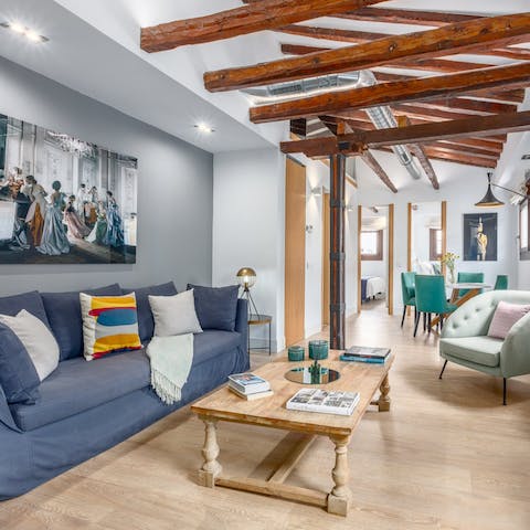 Relax in the bright living space after a busy afternoon exploring the city