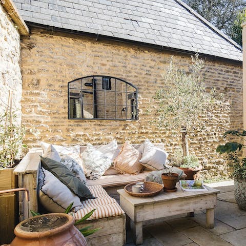 Tuck into a cheeseboard and share a glass of something sparkling alfresco