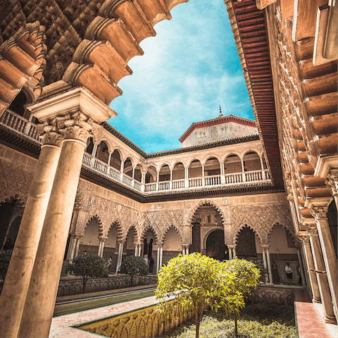 Spend an afternoon at the Royal Alcázar of Seville, eight minutes on foot from your door