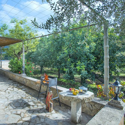 Try cooking some Mallorcan dishes on the barbecue, then dine alfresco on the rustic stone patio