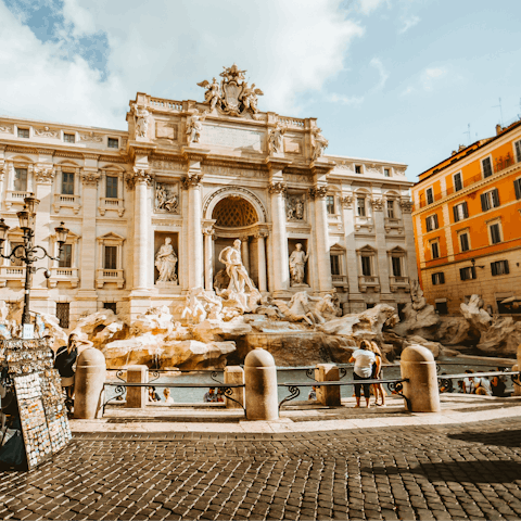 Make a wish at the iconic Trevi Fountain, less than twenty minutes on foot