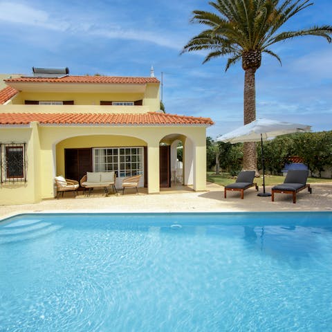 Spend afternoon floating about in the pool or relaxing on a lounger