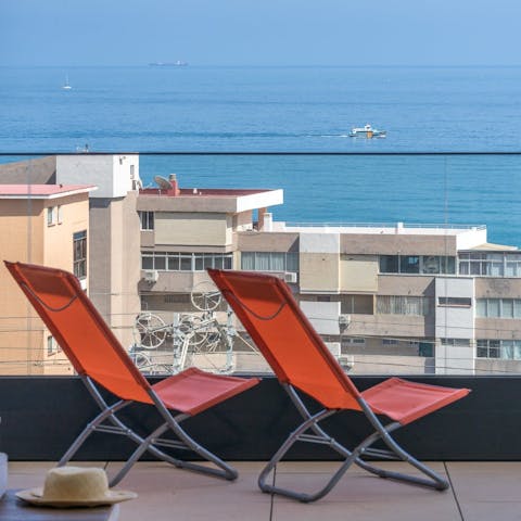 Stretch out on the loungers with a sangria and soak up the sea views