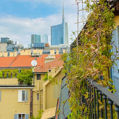 Enjoy views over Milan as you sip a pre-dinner cocktail