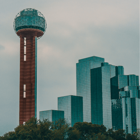 Get some snaps of the city from the GeO-Deck at Reunion Tower, a twenty minute stroll away from this home