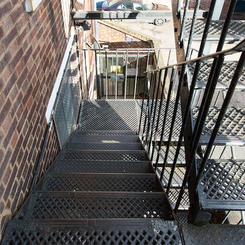 Feel like you're in a movie with the New York style fire escape style entrance