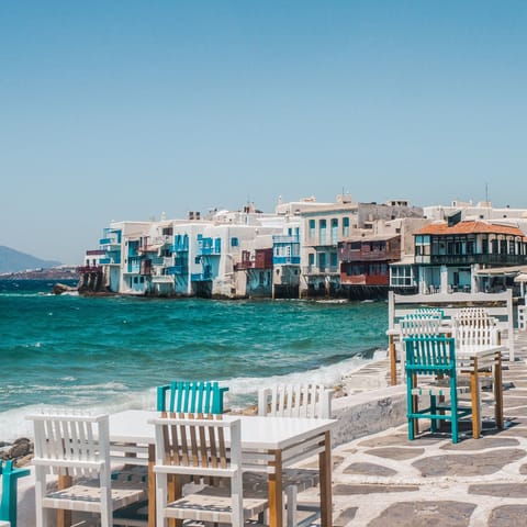 Stroll the atmospheric streets of Mykonos old town – a short drive away