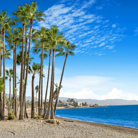 Sprawl out on San Pedro de Alcantara beach, moments away