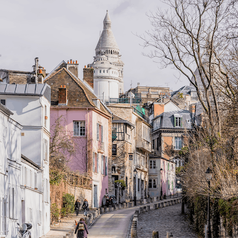 Explore vibrant Montmartre on the way to Sacre-Coeur, minutes away