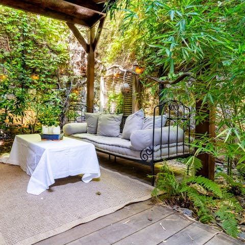 Grab a glass of wine and enjoy the romantic outdoor space