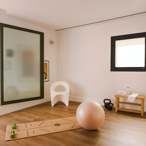 Start your day with your sun salutations in the hotel's communal workout studio