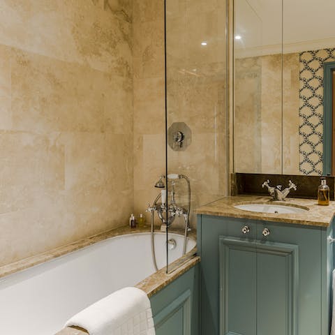 Treat yourself to a long soak in the marble-framed tub after a day of exploring the city on foot
