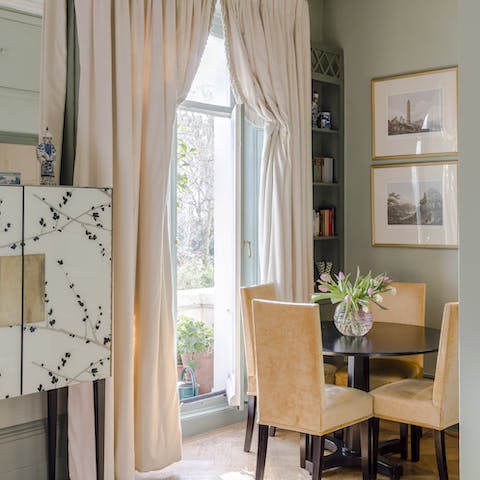 Sit down to an elegant meal at the window-side table