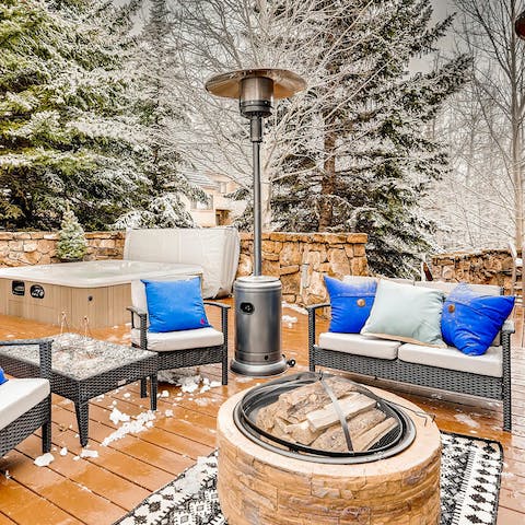 Relax on the patio in winter around the fire pit and heaters