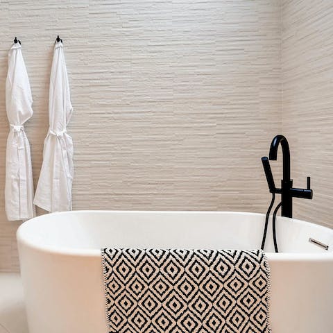 Warming up is easy in the luxe bathrooms