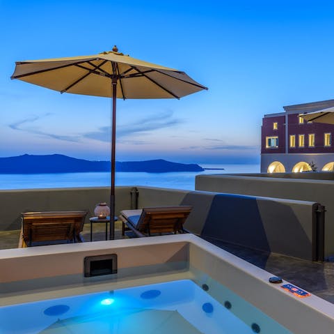 Slip into the hot tub for a sunset drink and stay to relax for long after