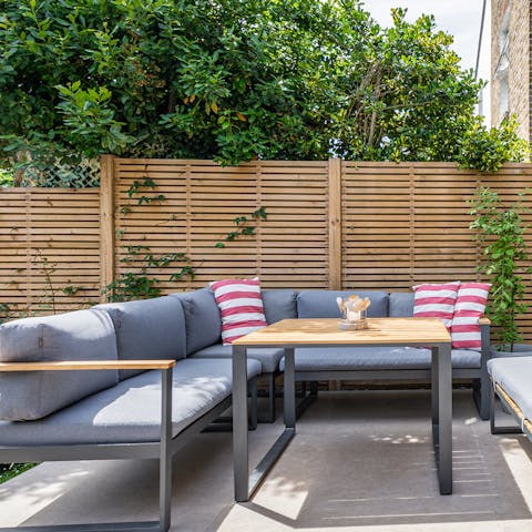 Kick back and relax on the terrace's plush outdoor seating