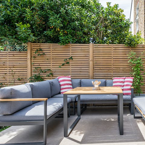 Kick back and relax on the terrace's plush outdoor seating