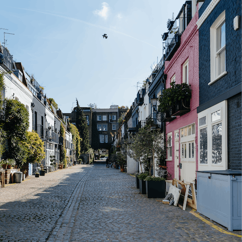 Explore the colourful houses and mews of nearby Notting Hill