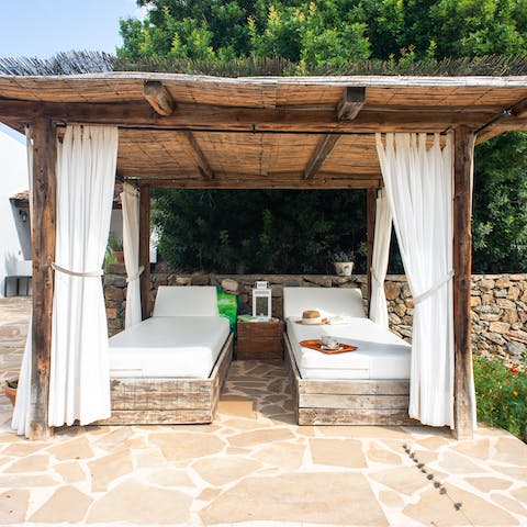 Lay back under the pergola with a good book
