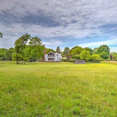 Feel like you're living on an estate with two acres of land to explore