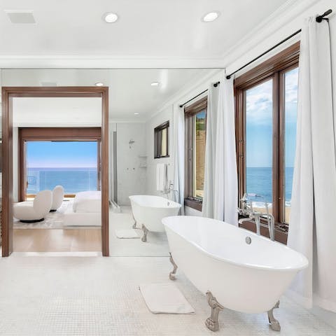 Treat yourself to an indulgent bath with a view as you soak in this freestanding tub