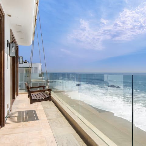 Grab a book and enjoy reading to the soundtrack of the waves and lapping water