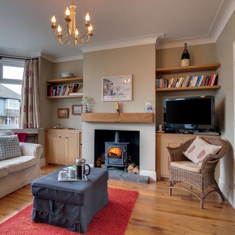 Warm up in front of the lounge’s wood-burning stove