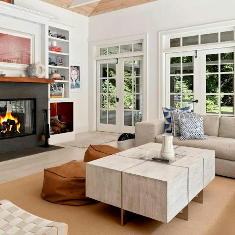Snuggle up by the warmth of the wood-burning fireplace 